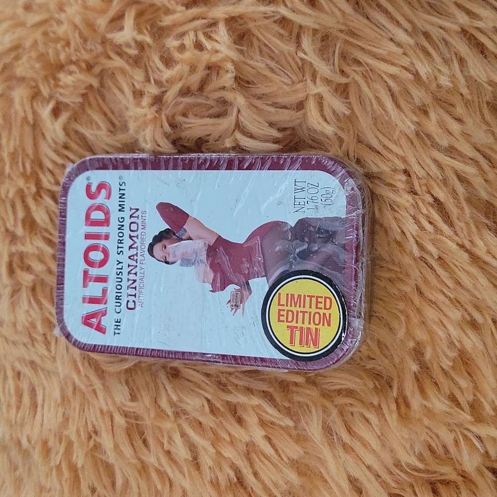 Altoids pin up girl tin can never opened